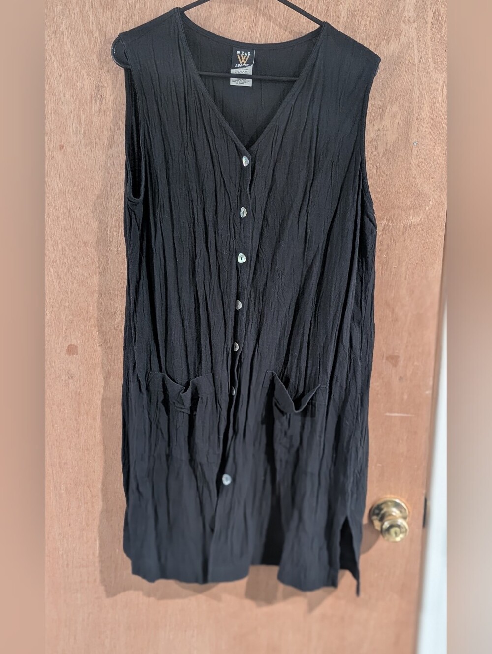 Sleeveless Black Button-Front Tunic